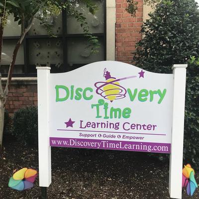 Discovery time daycare sign