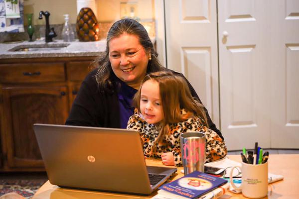 Denise with her granddaughter. Introduce them to finance while t