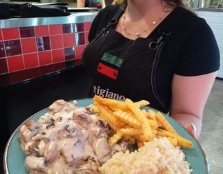 Friendly staff at L'artigiano pizza