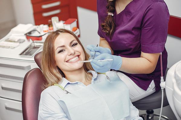 A close up picture of a patient getting a dental check-up