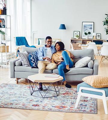 Family resting on a couch